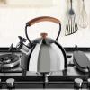 imageOGGI Tea Kettle for Stove Top  85oz  25lt Stainless Steel with Loud Whistle ampamp StayCool Wood Handle Ideal Hot Water Kettle and Water Boiler  Warm GrayStainless Steel
